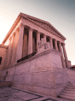 US Supreme Court building reddish lighting