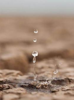 Teardrop or rain on dry dusty ground