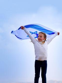 Israeli freedom girl with Israel flag concept