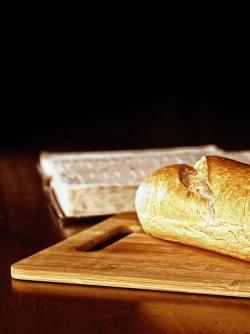 Bible and bread on a wooden board biblical diet