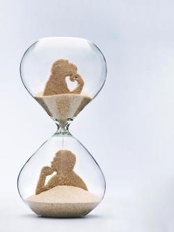 Ape and Man in hourglass