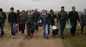 a group of Syrian refugees entering Europe