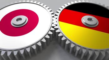 two gears meshed together, one depicting the Japanese flag the other the German flag