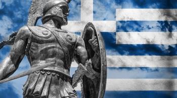 Ancient Greek soldier with modern Greek flag