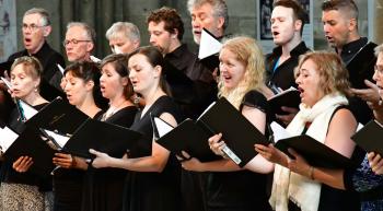 people singing in a choir