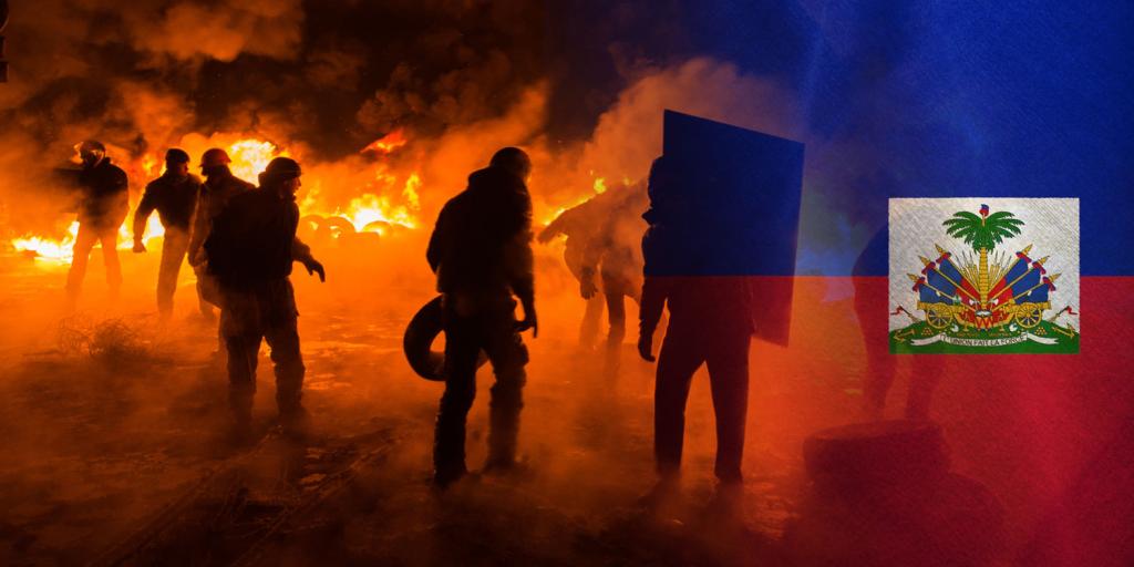 rioters with fire and a Haitian flag