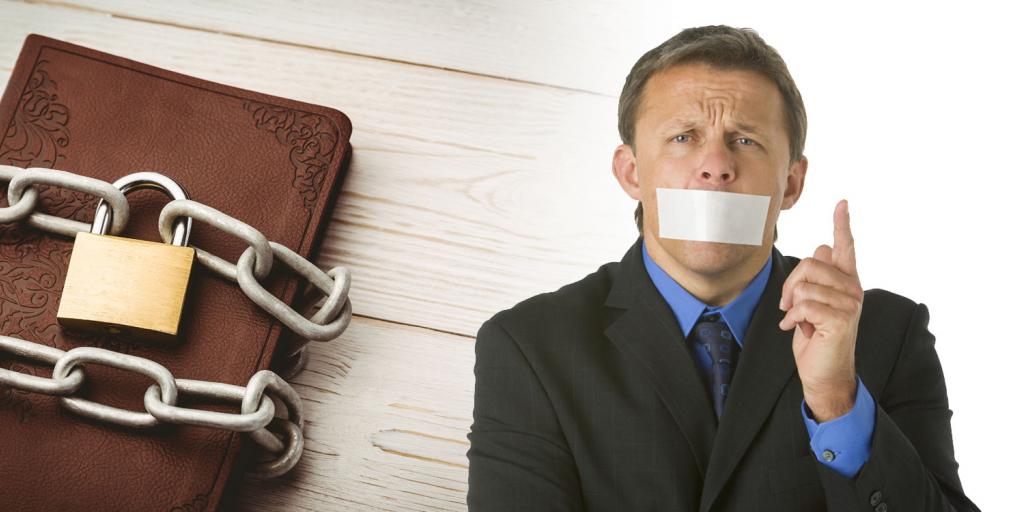 chained bible next to a person with tape over their mouth