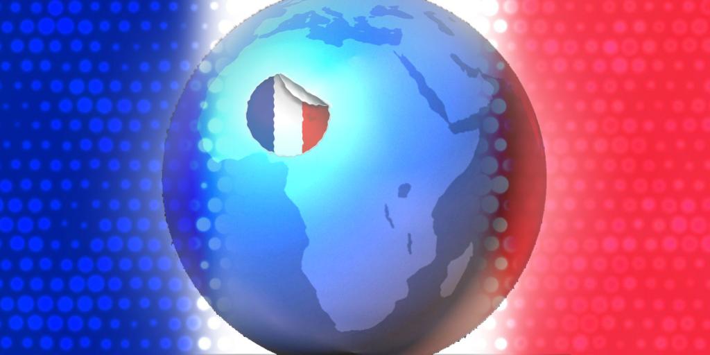 globe showing African continent with a sticker of a French flag being peeled off
