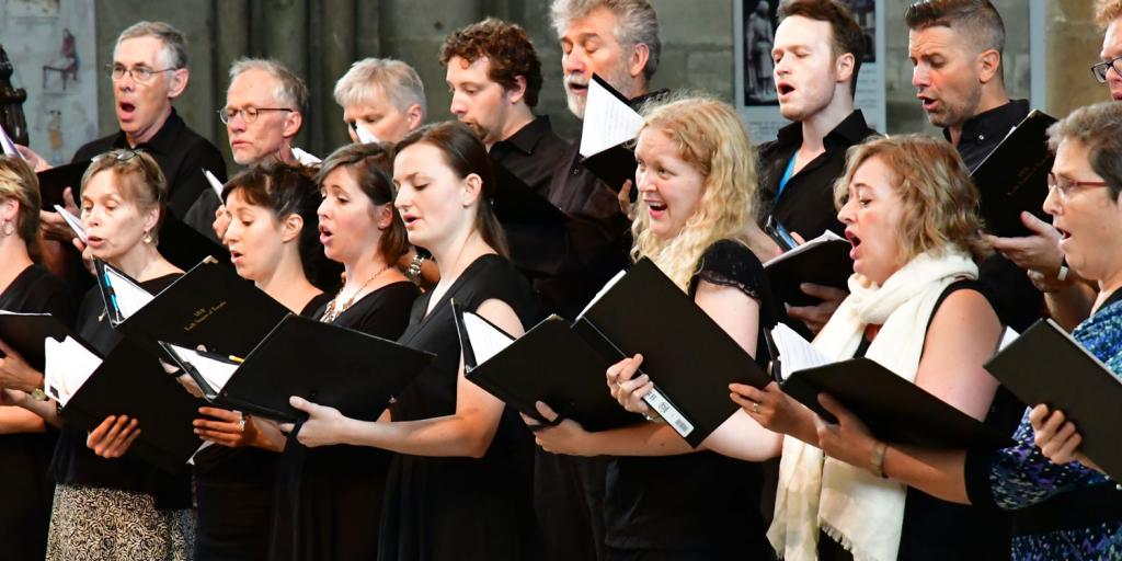 people singing in a choir