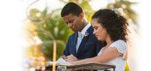 groom and bride praying at wedding ceremony