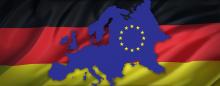 german flag with europe superimposed upon it