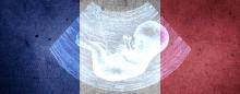 French flag overlaid with a sonogram of an unborn child