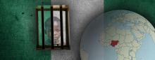 nigerian flag in background with globe showing location of Nigeria and a child peering through a barred window